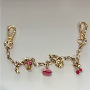 Gold Bag Charm Bracelet with Pink Accents